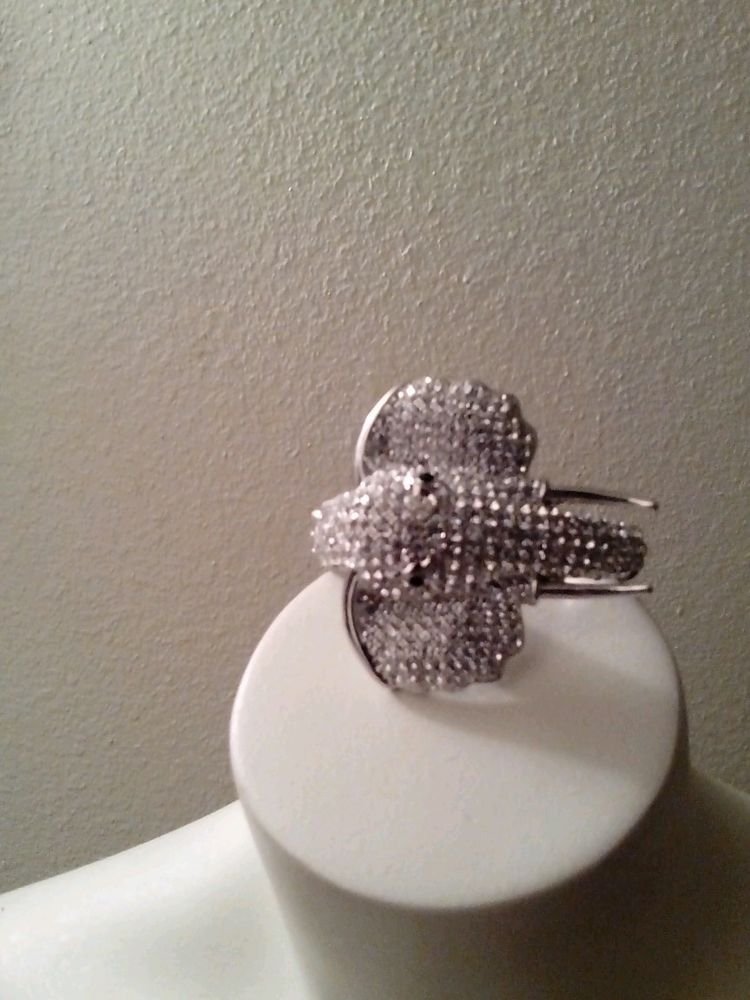LOT OF 3 WOMENS RHINESTONE BRACELETS ELEPHANT FLOWER AND A CONCHO