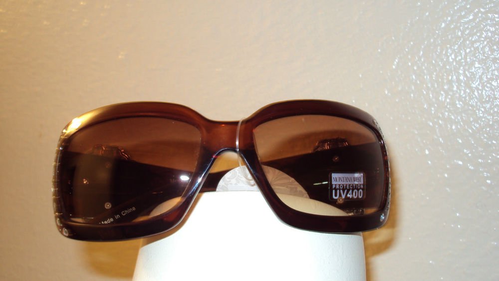 MONTANA WEST COWGIRL SUN GLASSES WITH A TURQUOISE CONCHO CROSS ON THE SIDE ARMS