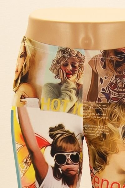 WOMENS SUBLIMATION LEGGINGS WITH GRAPHIC ART FACES ON THEM SIZE S M L