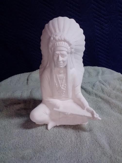 Indian chief sitting With Peace Pipe