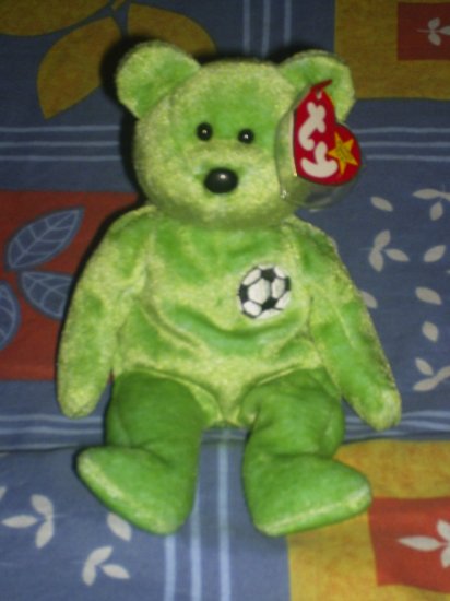 kicks the soccer bear