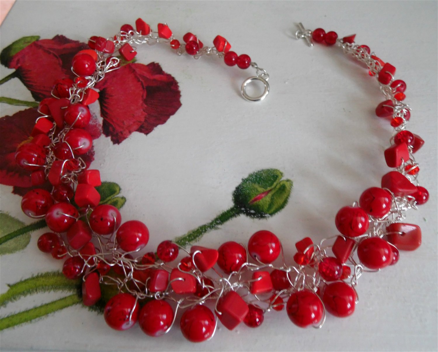 Red crochet wire necklace, coral red glass beads
