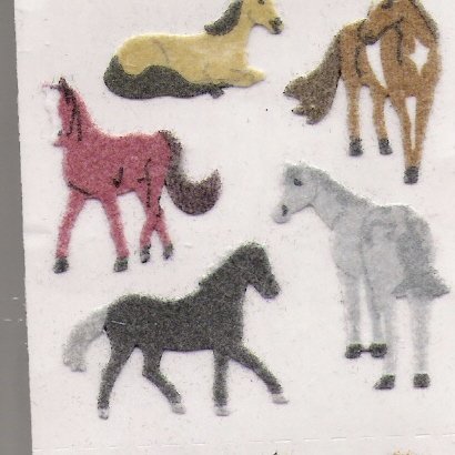 Fuzzy Red and Grey Horses