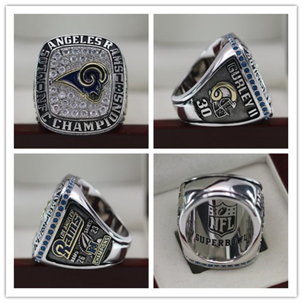 Lot Detail - 2001 ST. LOUIS RAMS NFC CHAMPIONSHIP RING PRESENTED TO PLAYER  TOMMY POLLEY