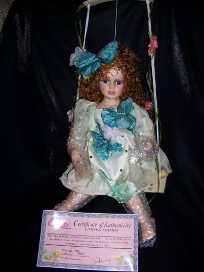 Dora is a Pretty Porcelain Collectible Doll From theCathay Collection