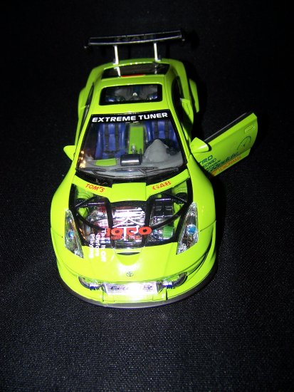 Green Extreme TunerToyota Celica car with moveable doors and working lights