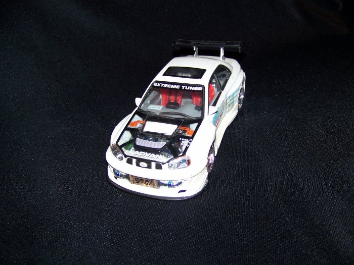 White Extreme Tuner Sti Subara Car with moveable doors and hood, also has working lights