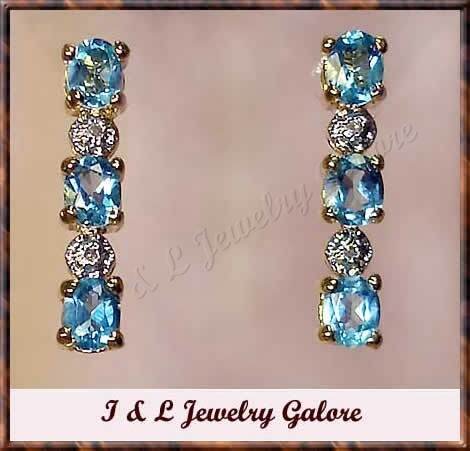 3.28 carat Blue Topaz & Diamond earrings