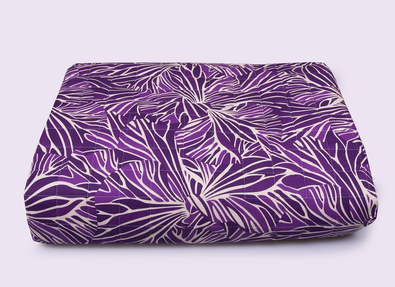 Missoni bedspreads with stylized leaves on purple colors for double bed