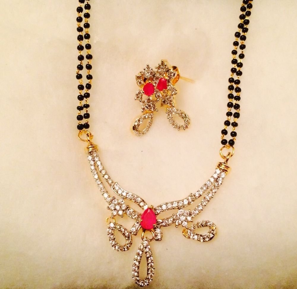 Diamond Mangalsutra With Beautiful Diamond Earrings
