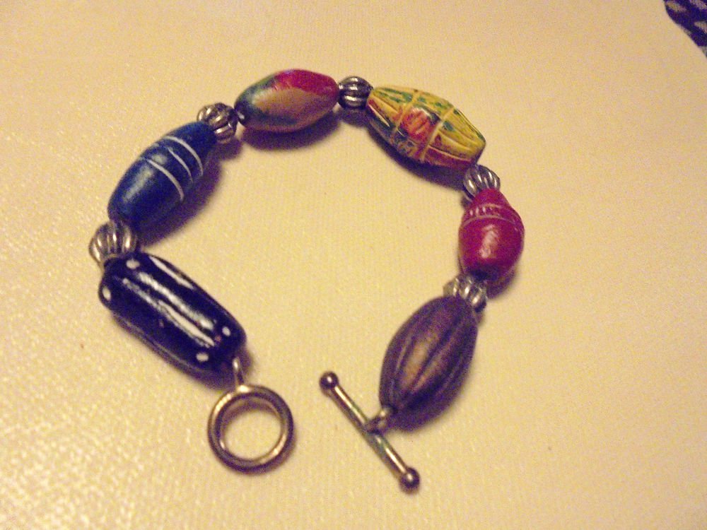 NICE VINTAGE WOODEN DECORATIVE BRACELET WITH EYELET CLOSURE...APP SIZE 7 1/2" ..