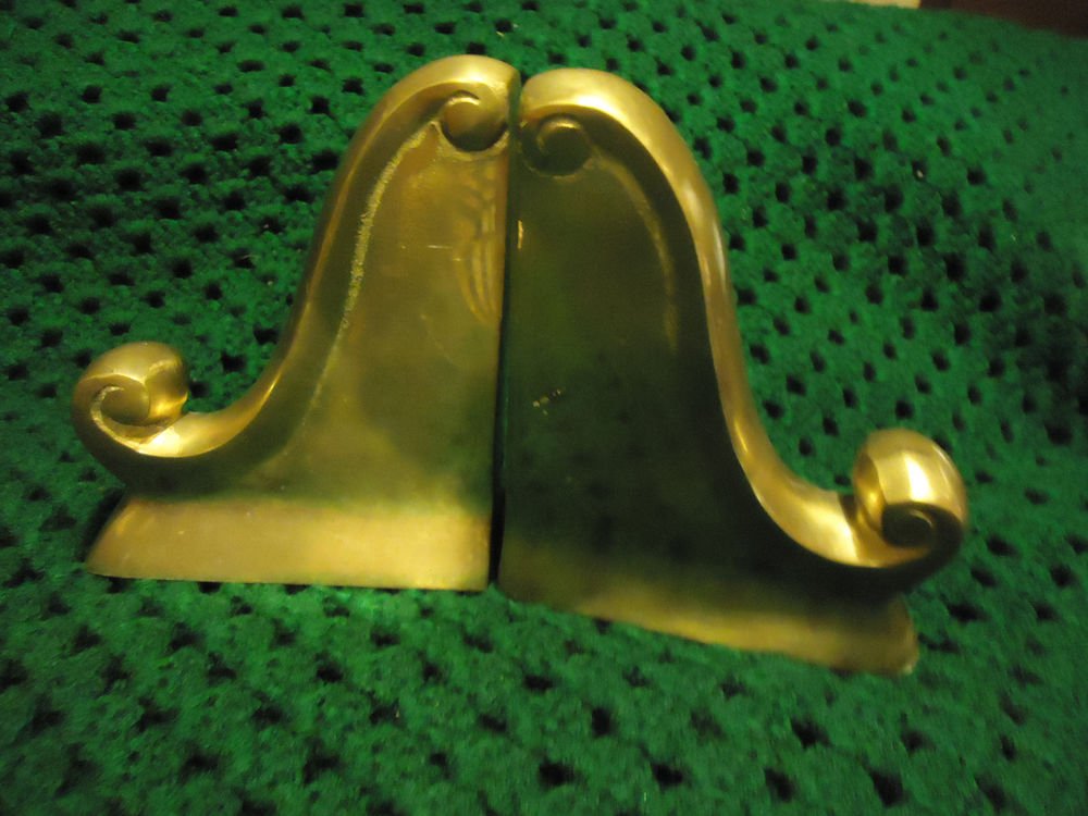 VINTAGE PAIR BRASS BOOKENDS HOLLOW DECOR ORNATE CAST....APPROX 5 1/2" TALL