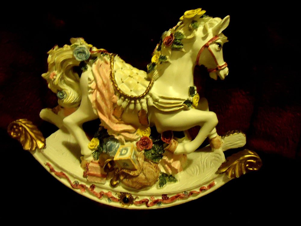 ROCKY HORSE MUSIC BOX...SO COLORFUL & PRETTY....APPROX.....9" WIDE 7" HIGH