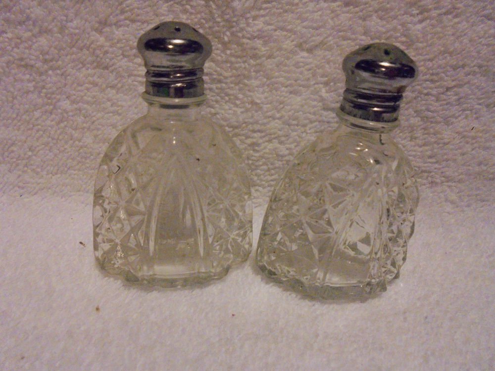 NICE CRYSTAL SALT & PEPPERS SHAKERS....APPROX 2 3/4" TALL