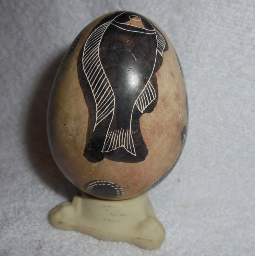3" TALL BLACK & TAN STONE PAINTED EGG SHAPED EGG WITH FISH & WITH STAND...