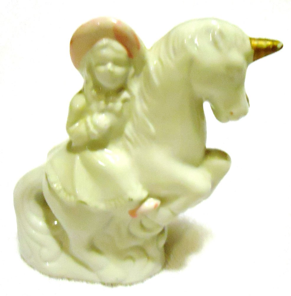 VINTAGE PORCELAIN BOY ON UNICORN FIGURINE...