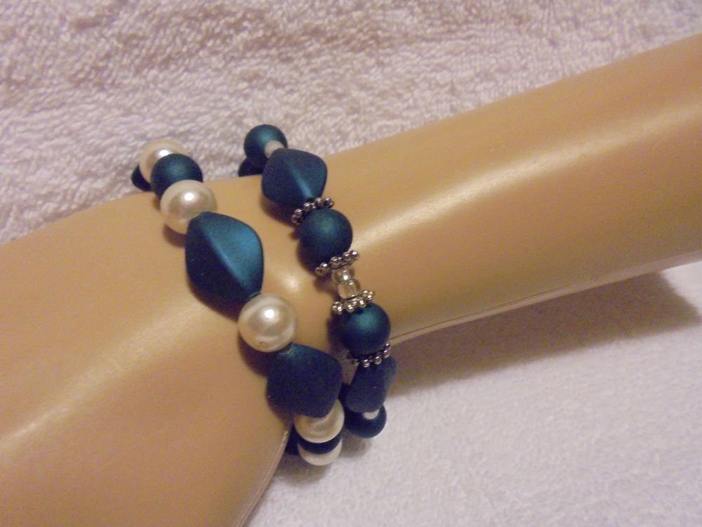 SET OF TWO AQUA/WHITE MATCHING BEADED BRACELET- NICE BEADING...UNIQUE..STRETCH