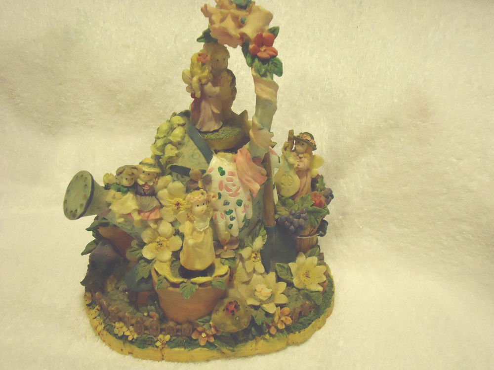 MUSICAL FLORAL FIGURINE-PLAYS "WIND BENEATH MY WINGS" MOVABLE FIGURES AS IT PLAY
