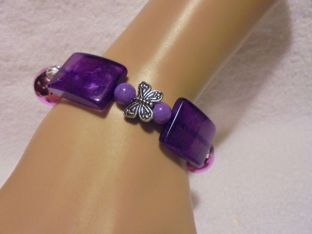 LARGE PURPLE/PINK BEADED BRACELET WITH BUTTERFLY CHARM...UNIQUE..STRETCH