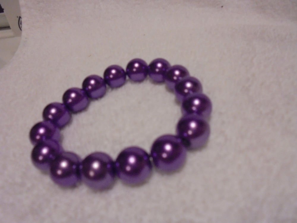 14 MM PURPLE BEADED BRACELET....EXPANDABLE....GREAT ACCENT
