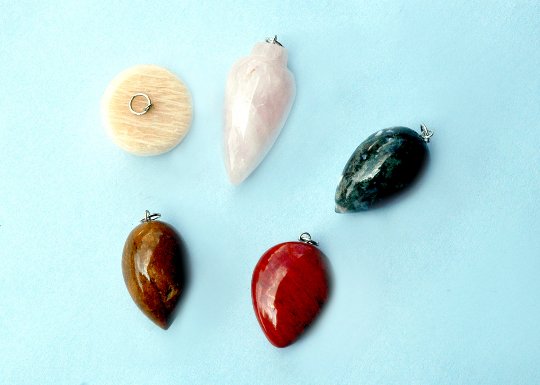Set of five unique and antique Stone pendents