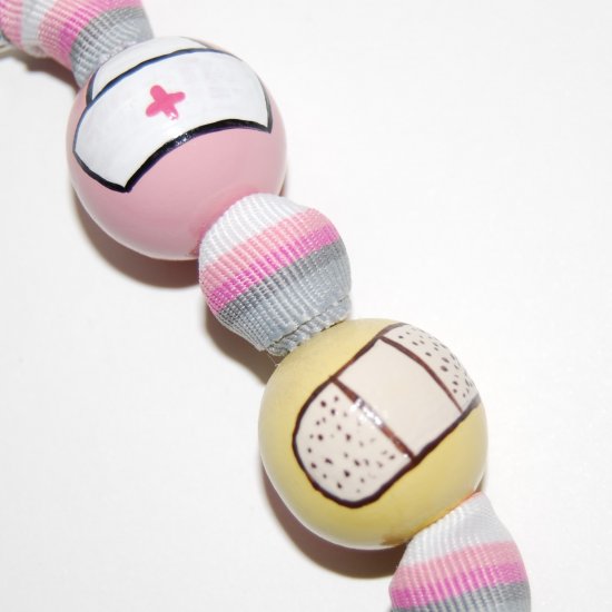 Handpainted Nurse Keychain on Pink Ribbon