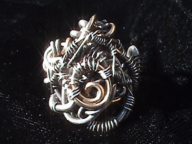Spiral Motion - Sterling Silver Ring with Gold Accents