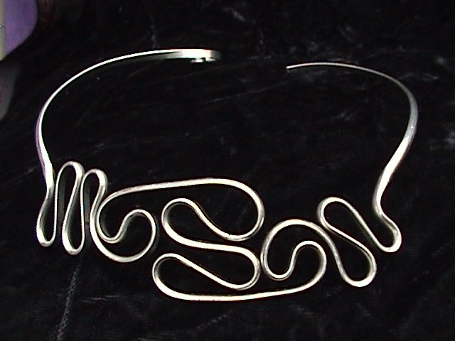 Waves in Motion Choker Shown in Nickle Silver.