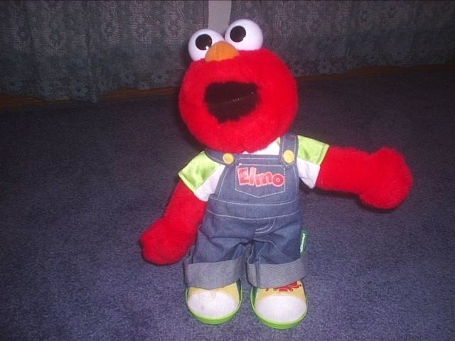 Let's Pretend Elmo Sings and dances
