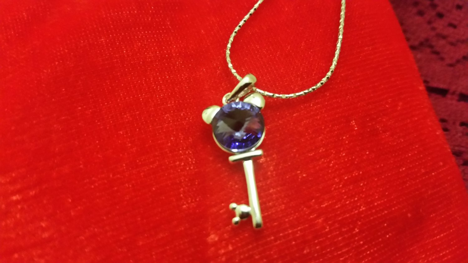 Blue Sapphire Key to my Heart Pendent
