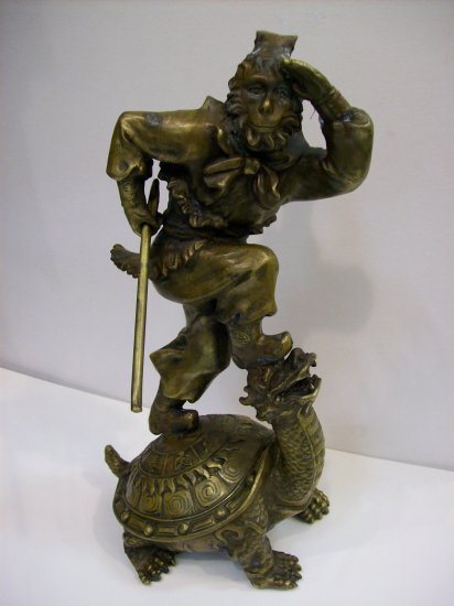 Bronze Monkey King on Top of Turtle