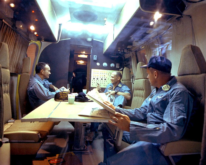 APOLLO 11 ASTRONAUTS IN THE MOBILE QUARANTINE FACILITY 8X10 NASA PHOTO (DA-708)