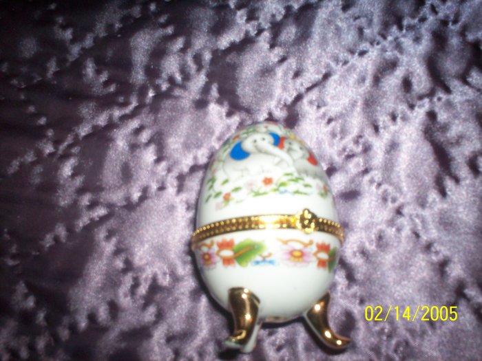 Egg shaped trinket with Elephants and flowers