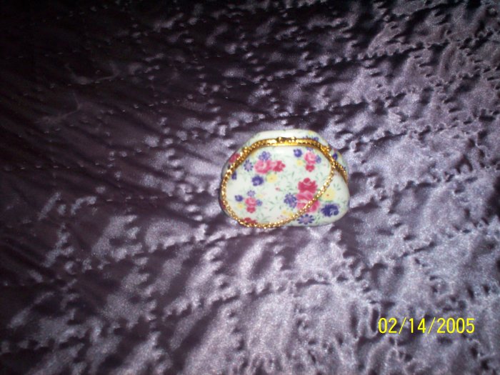 Pocketbook shaped trinket box.