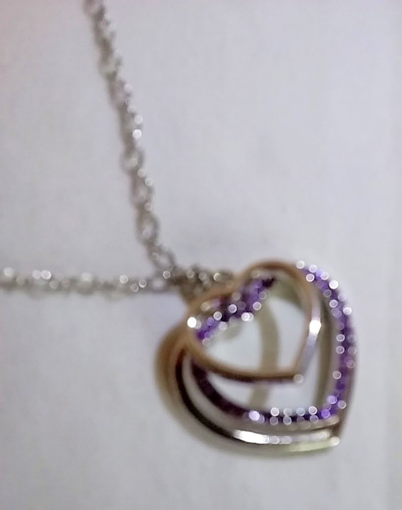 3 Hearts necklace with 2 heart pendants and one crystal purple heart. 18 inch chain