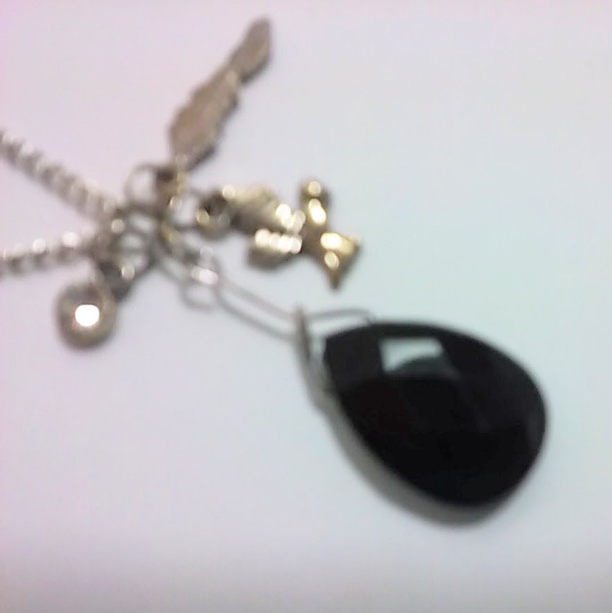 Antique style necklace with a feather, a bird, a rhinestone, and black jewel charms 18 INCH CHAIN