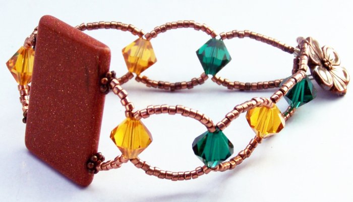 Goldstone, Copper, and Swarovski Crystals loop clasp bracelet