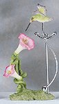ALAB SWING HBIRD OVER FLOWERS