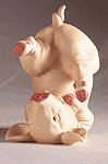 PORC. PIG LAYING WITH LEGS UP