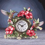 PORC. HUMMINGBIRD ON CLOCK