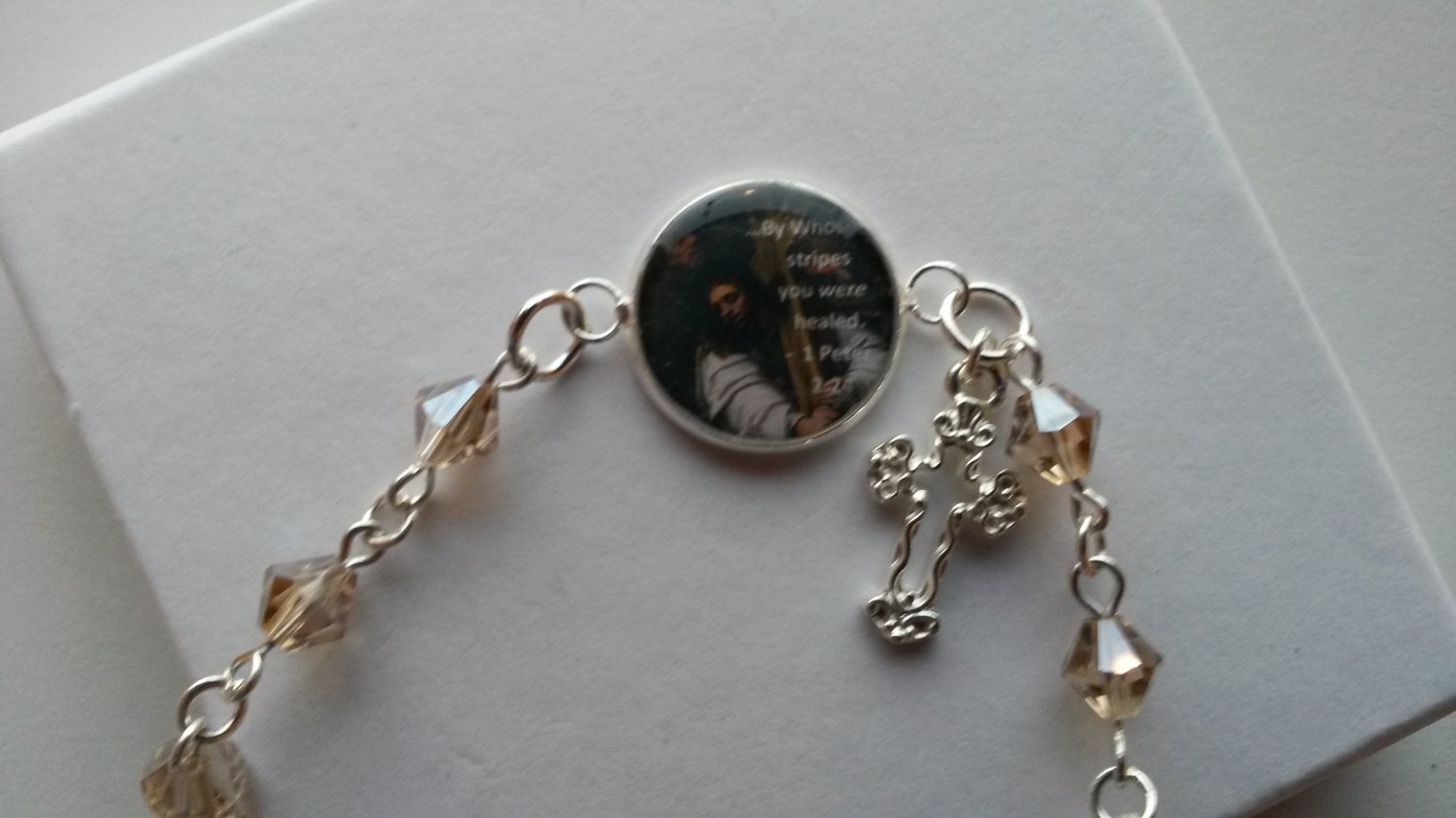Inspirational sterling silver swarovski crystal bracelet with a Bible verse 1 Peter 2:24 charm