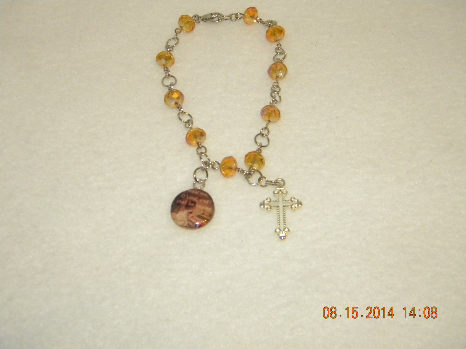 Golden glow charm bracelet w/ Jer.17:14 Bible verse charm and Cross