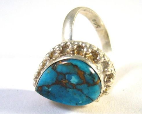 Old silver ring with turquoise