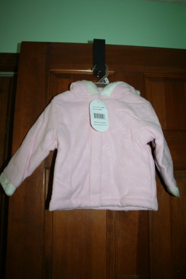 Pink colored winter hooded coat.