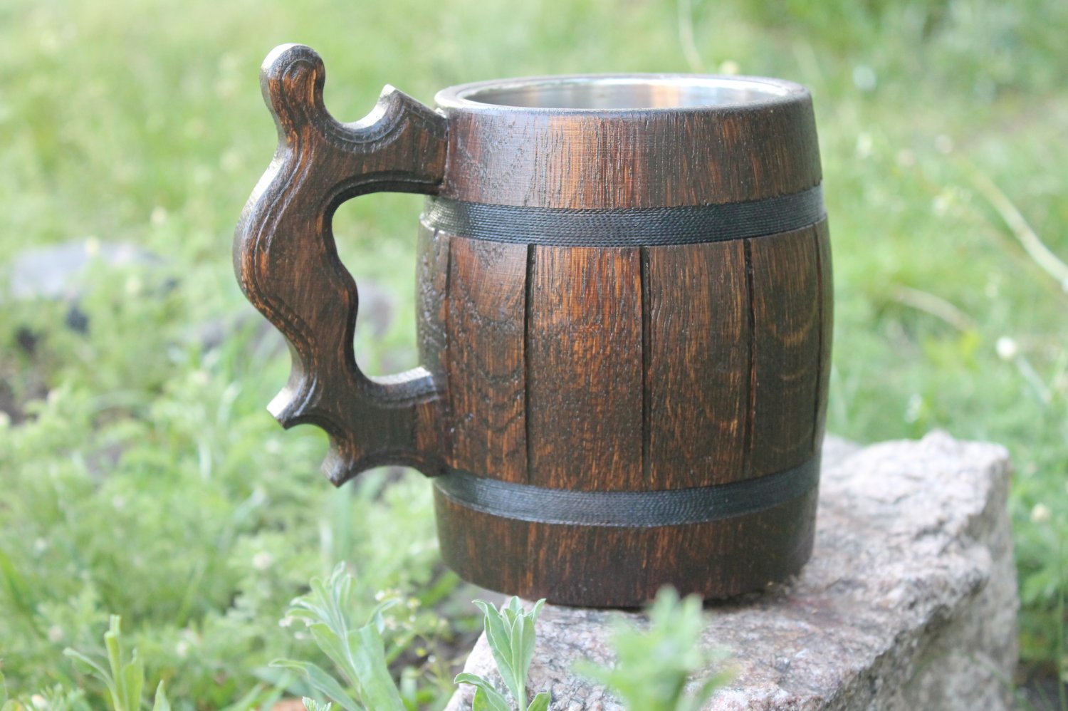 Dark wooden beer mug with metal cup inside
