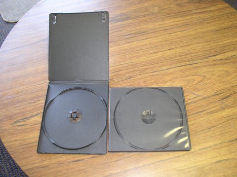 1000 SINGLE 7MM POLY CD/DVD CASES, BLACK - PSC8