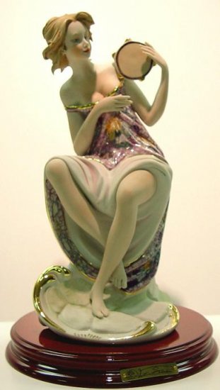 V. Sabadin Woman Holding Tambourine