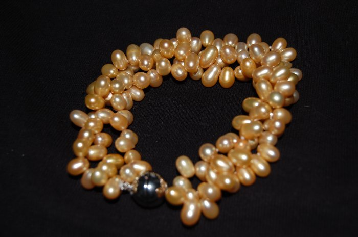 Triple Strand Zig Zag Gold Pearl Bracelet