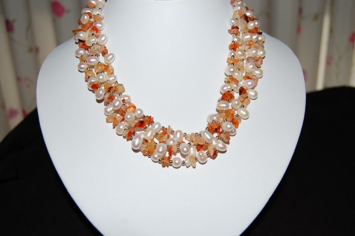 4 strand pearl w/ orange stone N1120