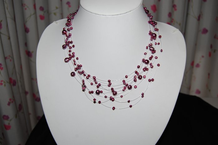 Celestial 10 strand pearl Cranberry N1150